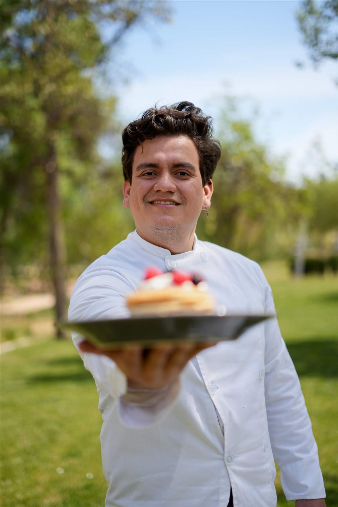 Michael Sepulveda, private family chef in Mallorca, presenting a red fruit tart