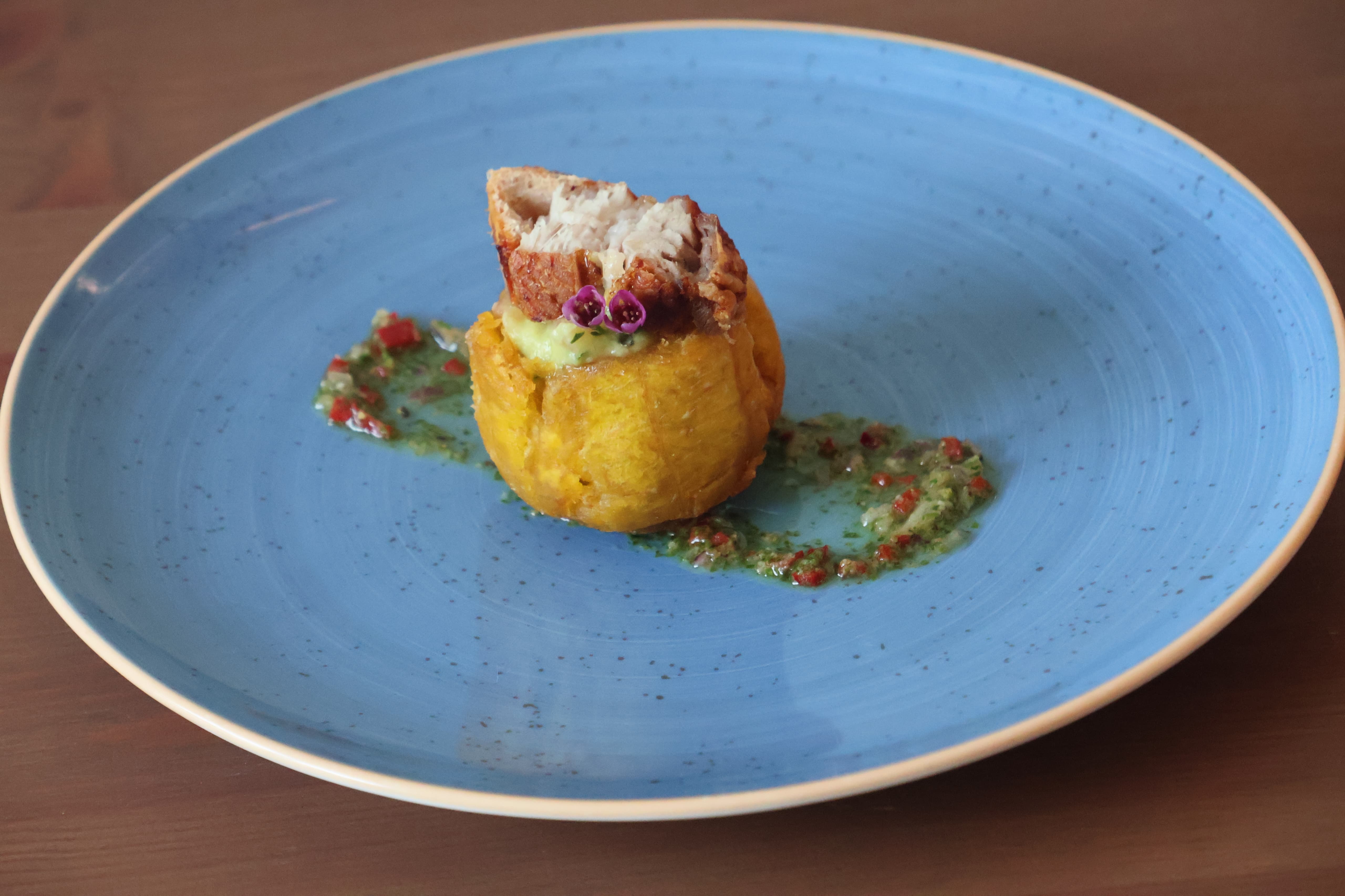 Mofongo de plátano with pork cracklings and pepper dressing — private villa hospitality